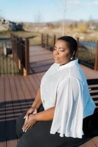 woman sitting with eyes closed