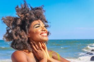 smiling woman at the beach