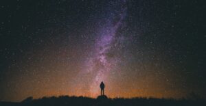 Starry Night with man standing outside