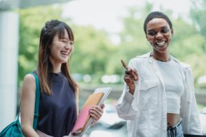 two women authentically smiling and laughing