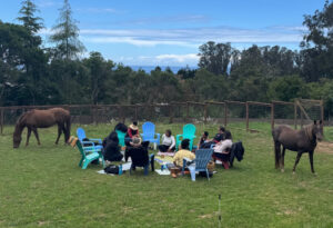 Group with horses at Beyond Liberty Equine Education and Horse Retirement Center