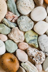 a variety of unpolished stones in many colors